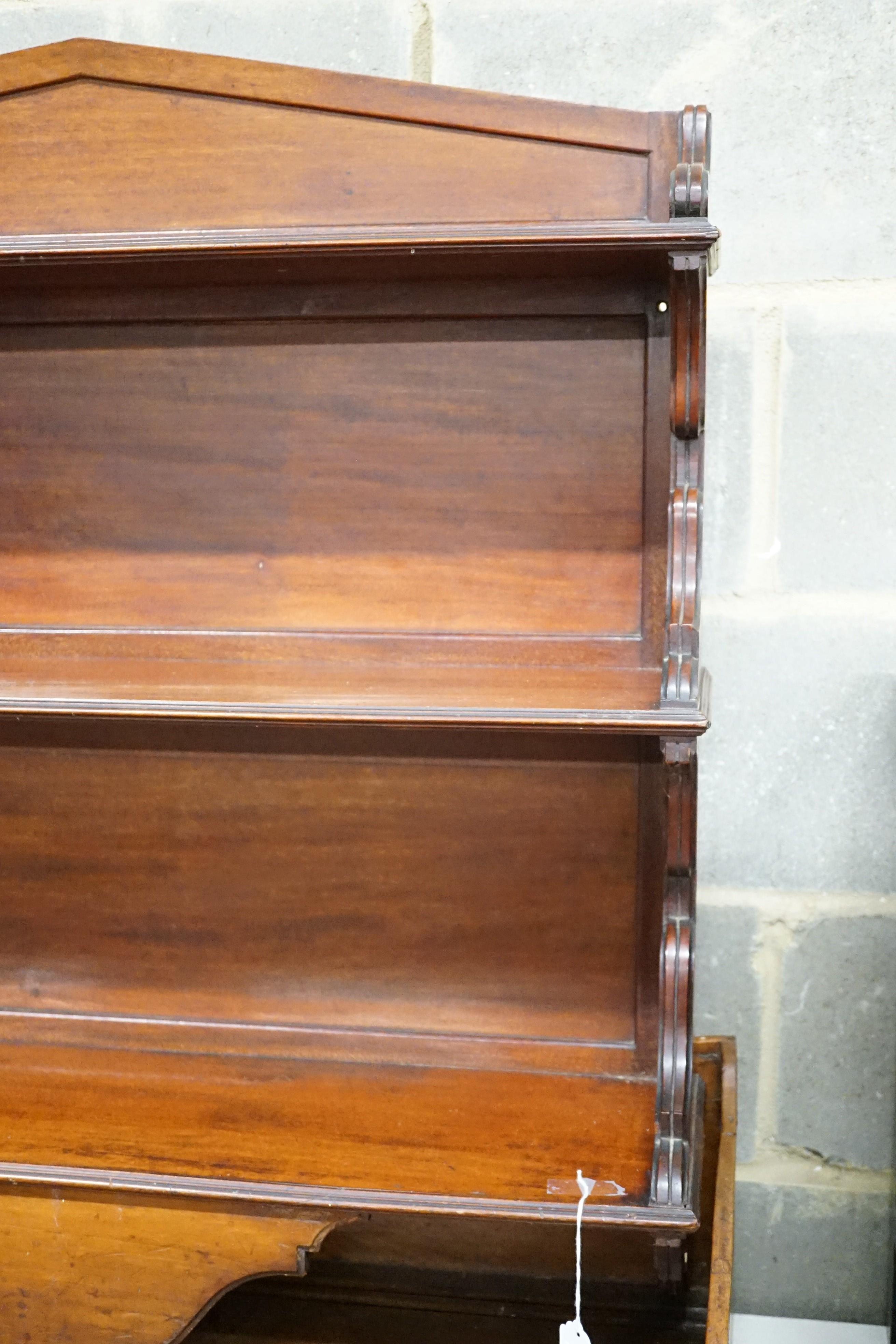 A late Victorian mahogany three tier wall shelf, width 86cm, height 86cm